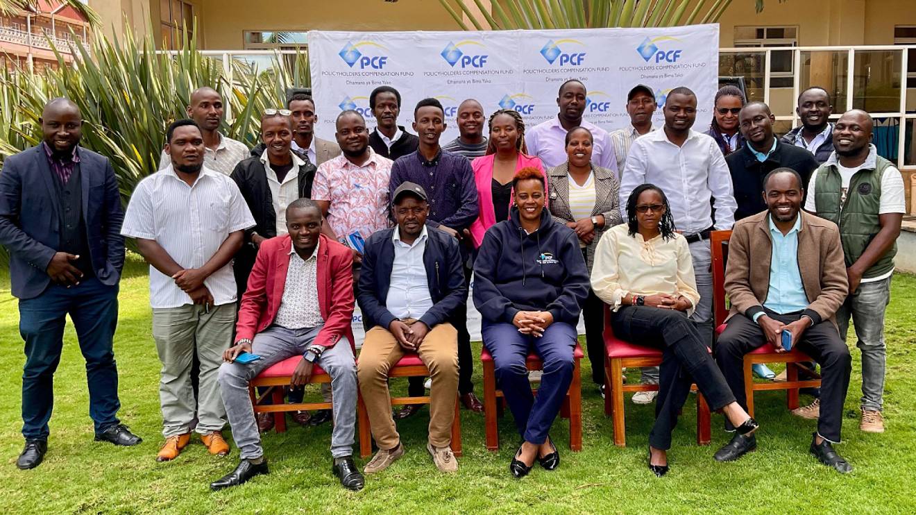 Rosemary Kavili (seated middle) with the Fund's staff and local journalists after a successful media training workshop at the sidelines of the Fund's PCFMtaani campaign in Meru County. PHOTO/COURTESY